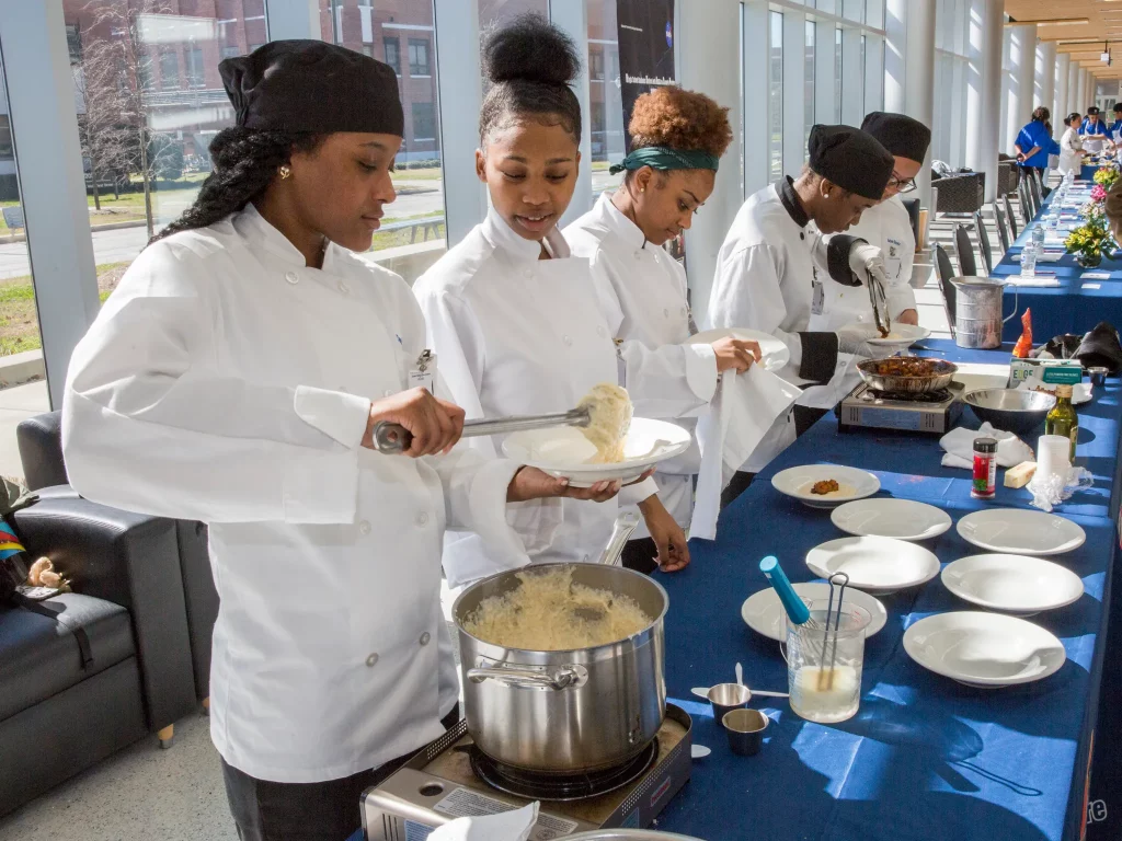 Students from Phoebus High School prepare their breakfast dish at HUNCH’s Preliminary Culinary Challenge at NASA’s Langley Research Center. Credits: NASA/David C. Bowman